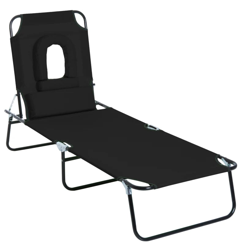 Outsunny Outdoor Folding Sun Lounger with Face Hole, 4 Level Adjustable Backrest Reclining Garden Lounger, Garden Recliner Sunbed with 600 D Oxford Cloth Seat and Pillow for Beach, Black